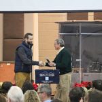 Jay and Chad Vincent shake hands during induction as President of HCAR.